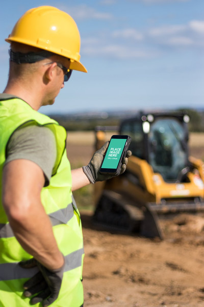 Construction man using iPhone 8