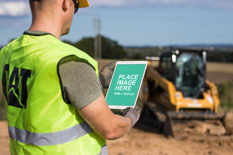 Construction working using iPad Pro
