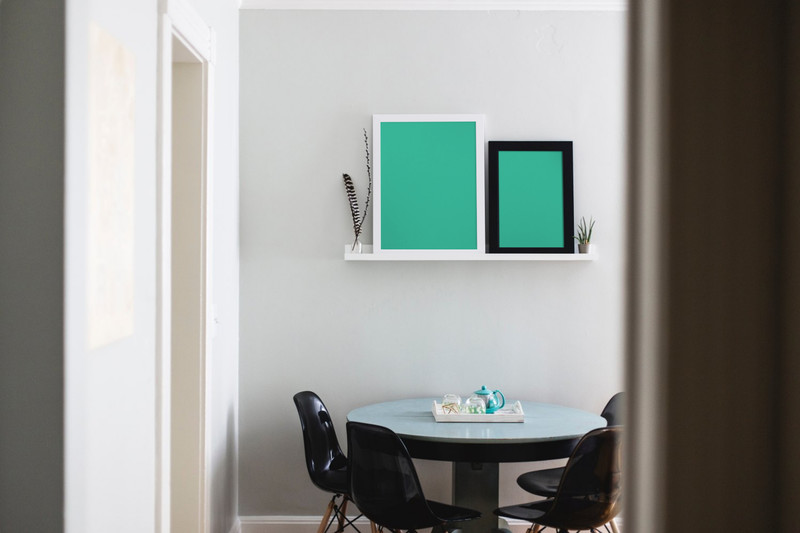 2 picture frames on shelf