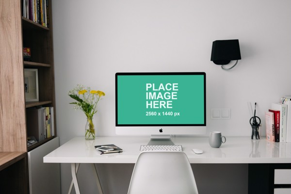 iMac on desktop table