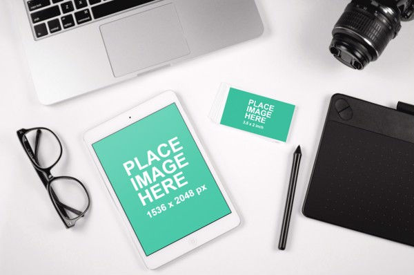 White iPad and Business card
