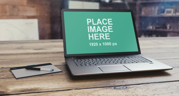 PC laptop on wooden table
