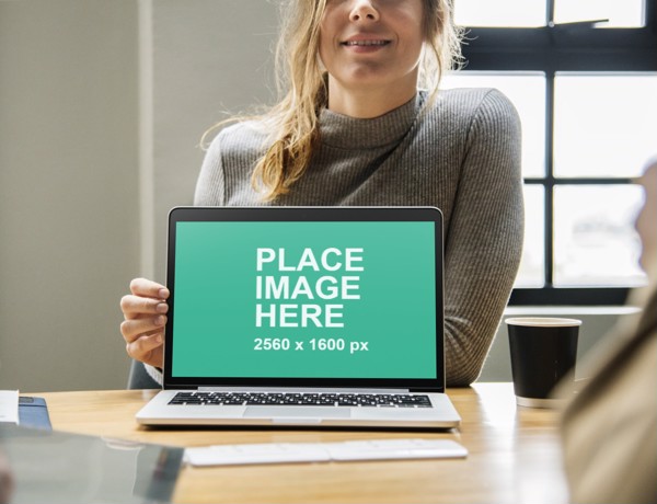 Woman with MacBook Pro