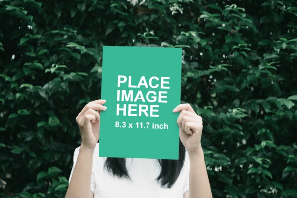 Woman holding paper