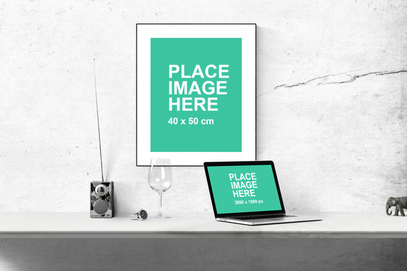 Frame and Laptop with concrete wall