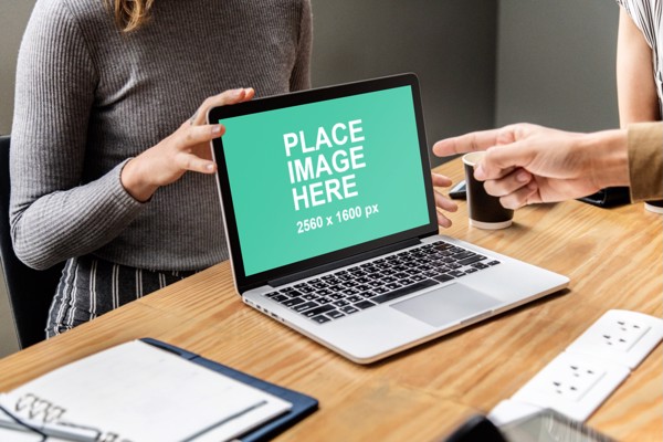 People working with MacBook Pro