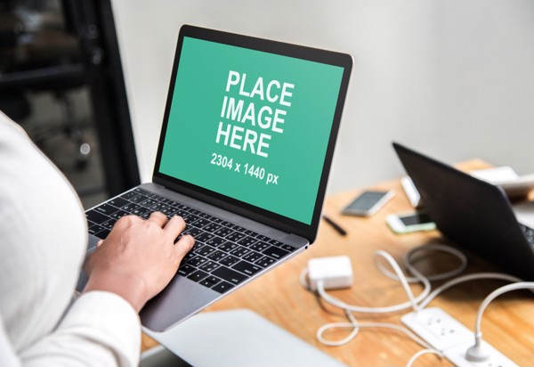 Woman using MacBook