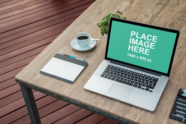 15 inch Macbook on table