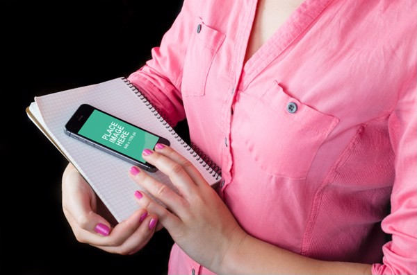 Woman using iPhone 5