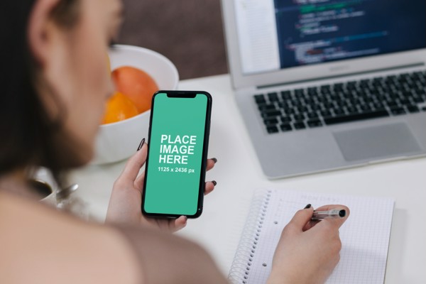 Woman using iPhone X