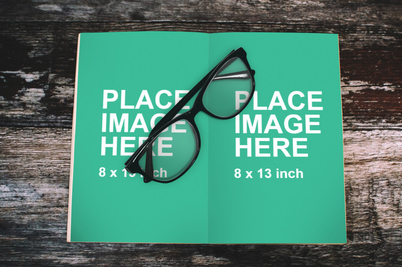 Open book with glasses