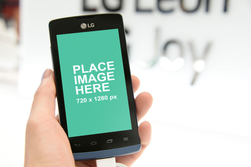Man holding LG phone