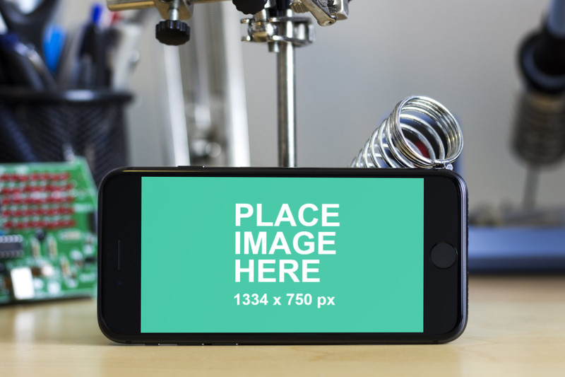 iPhone 8 with electronics landscape