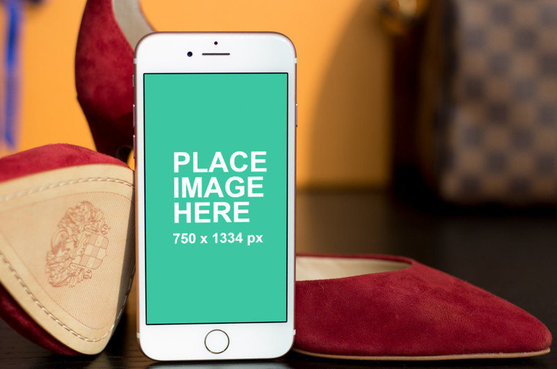 iPhone with red shoes