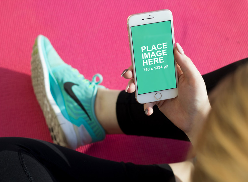Fitness woman with iPhone