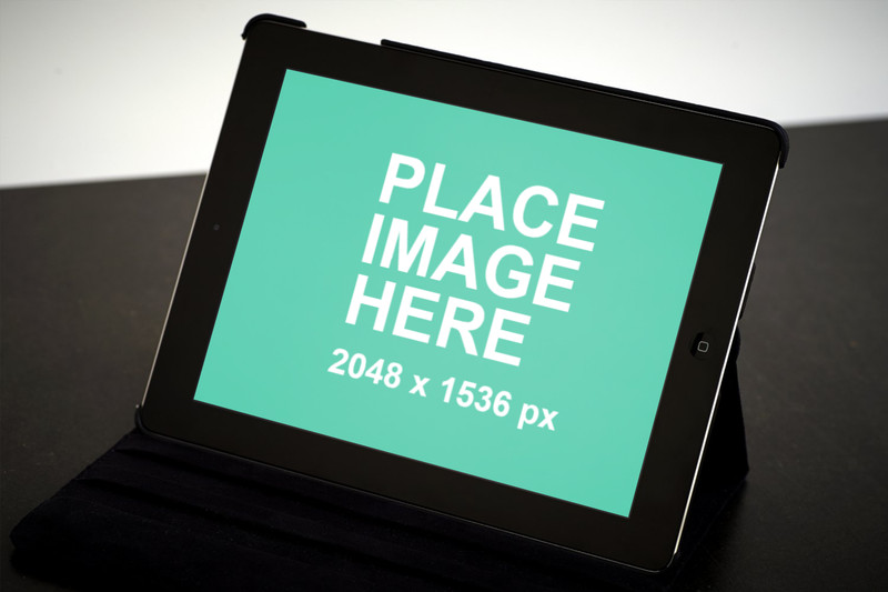 Black iPad in cover on a table