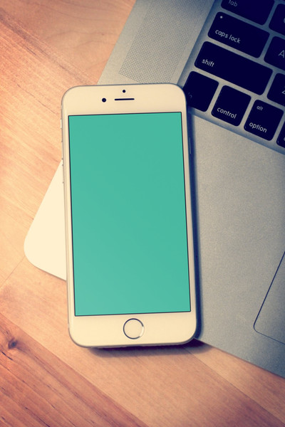 Closeup of iPhone on laptop
