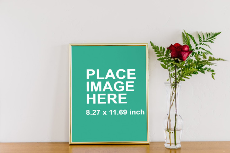 Gold picture frame and flower