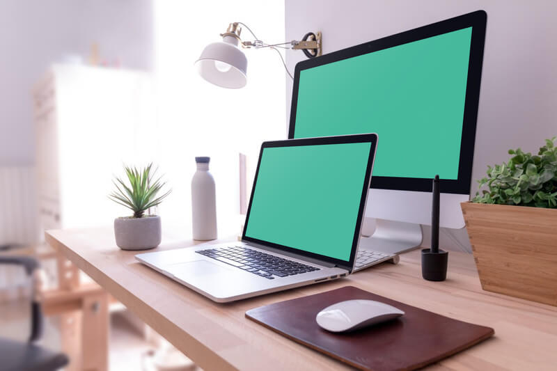 iMac and MacBook Pro on desk