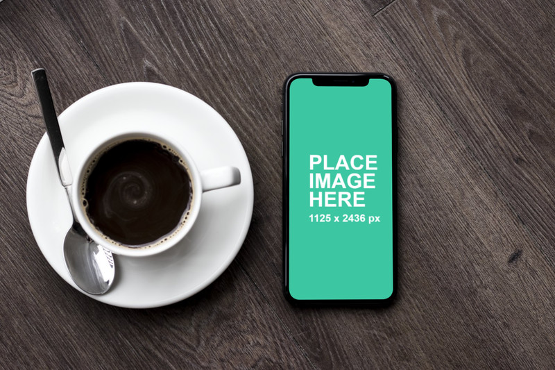 iPhone X on coffee table