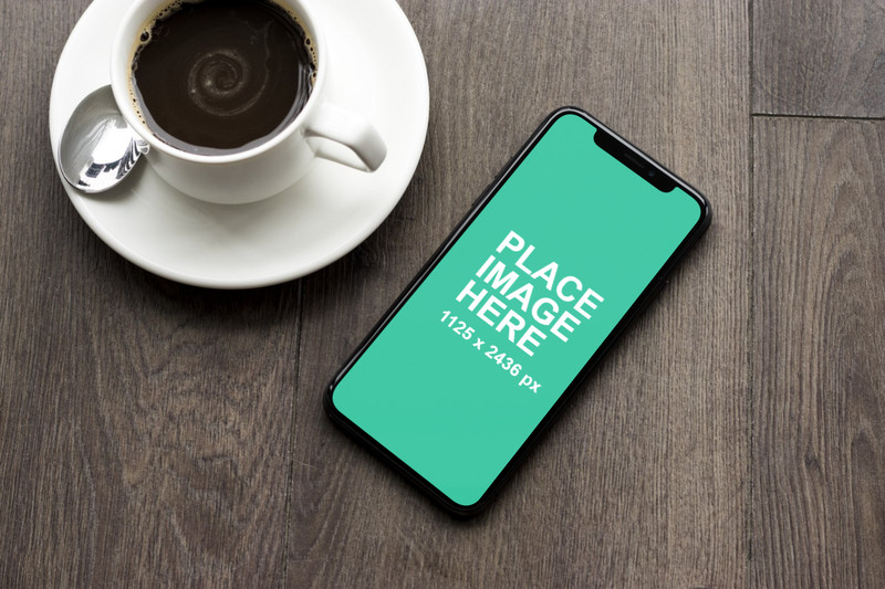 iPhone X on coffee table
