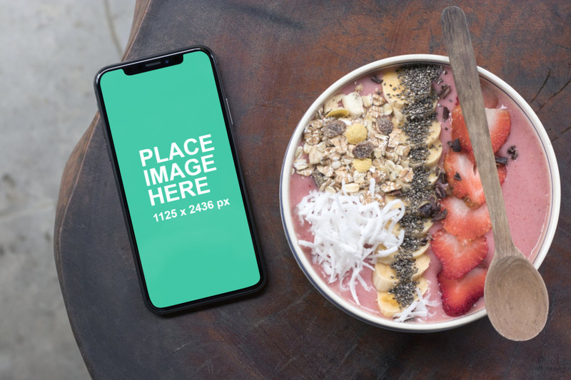 iPhone X with breakfast