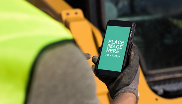 Construction man using iPhone 8