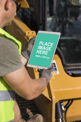 Construction worker using iPad