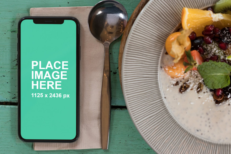 Fronview of iPhone X with food