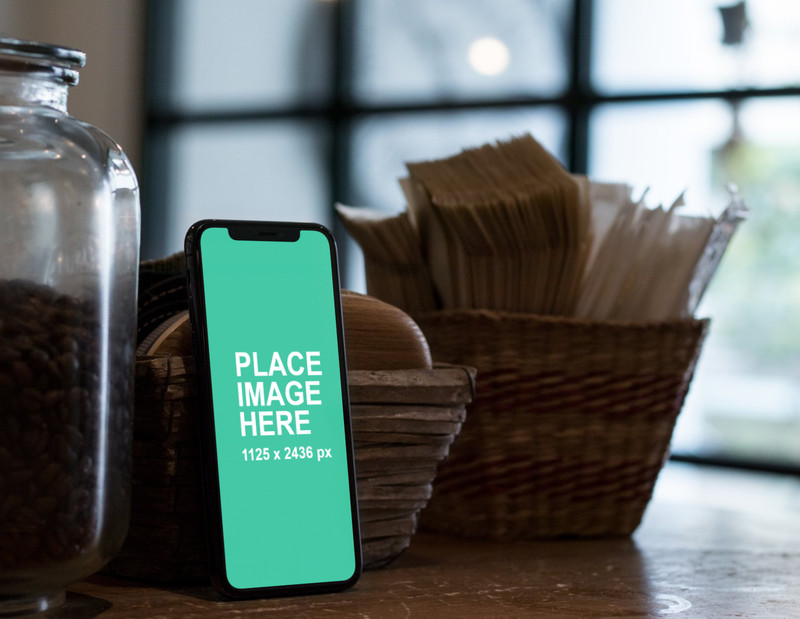 Standing iPhone X on table