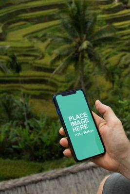 Man holding iPhone X