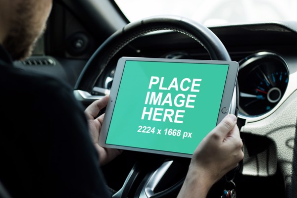 Man looking at iPad Pro