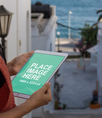 Woman holding iPad