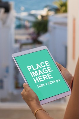 Woman holding iPad