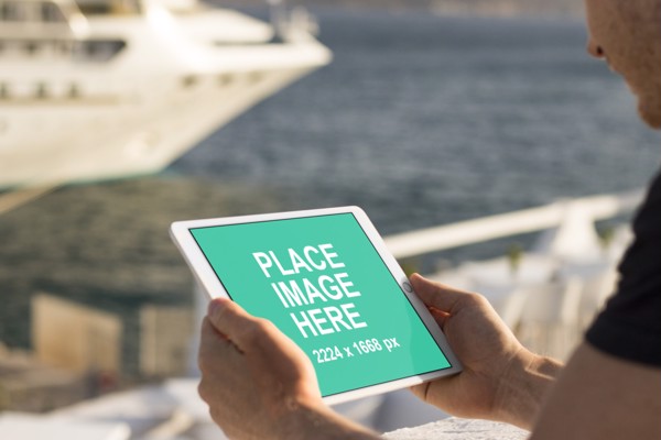 Man holding iPad Pro