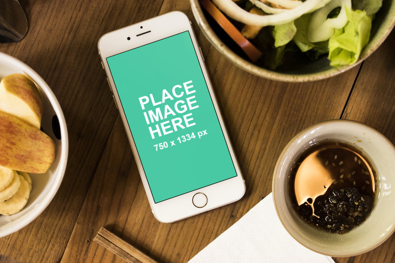 White iPhone 6 with food