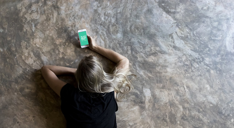 Topview of woman using iPhone 6S