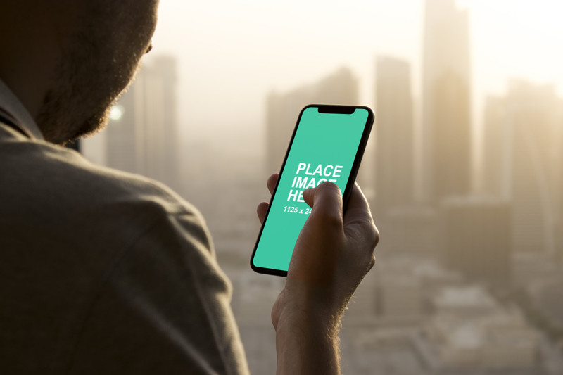 Man using iPhone X