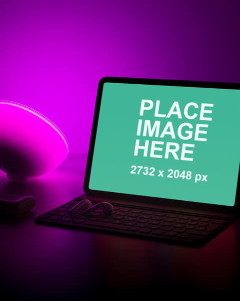 iPad Pro and keyboard with purple background