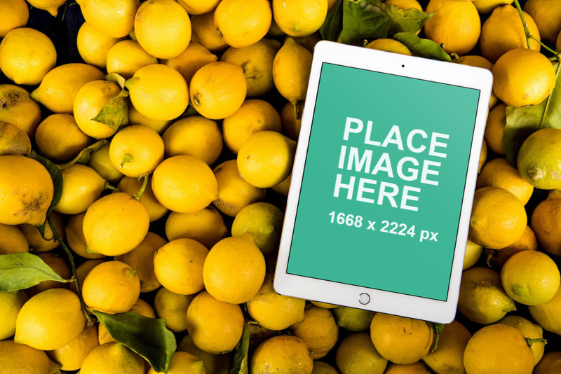 iPad Pro on bed of lemons