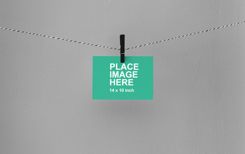 Small paper hanging in clothespin