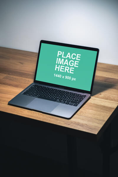 MacBook Air on wooden desk
