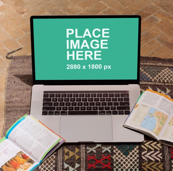 MacBook Pro on rug