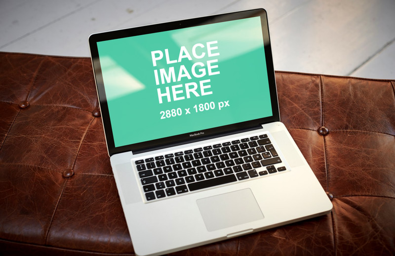 Macbook Pro on leather sofa