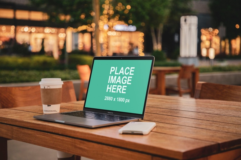 MacBook Pro on outdoor table