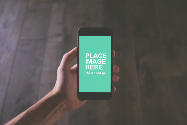 Man holding black iPhone