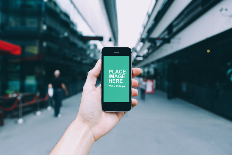 Man holding black iPhone