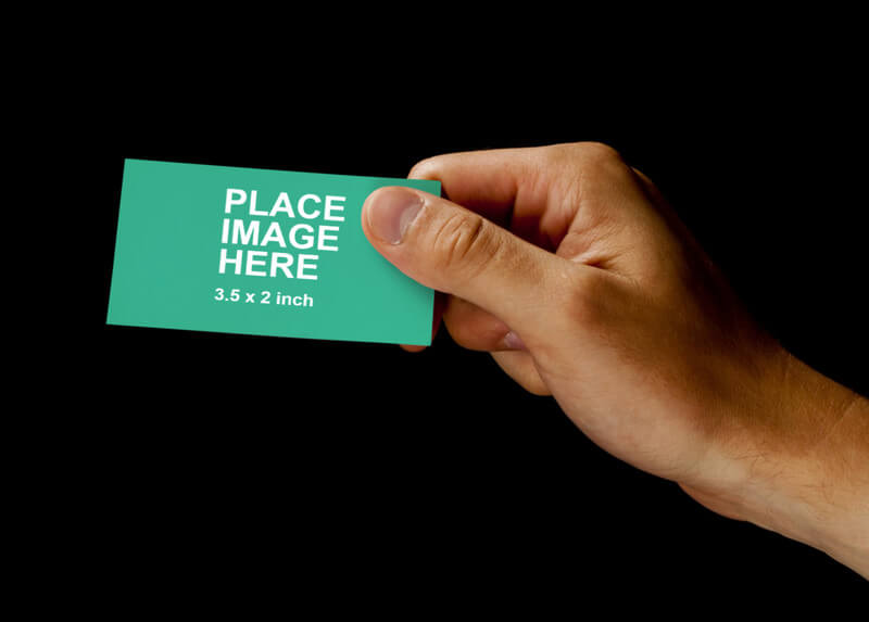 Man holding business card