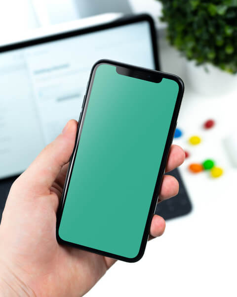Man holding iPhone X