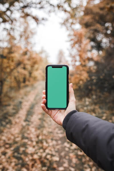 Man holding iPhone X